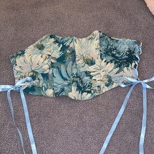 Blue patterned corset.